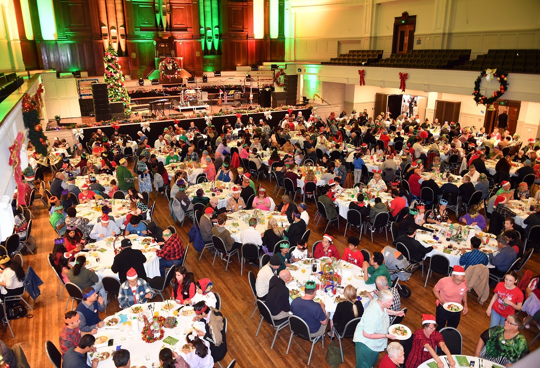 People from all over Dunedin gathered in the town hall for some festive fun and good food. 