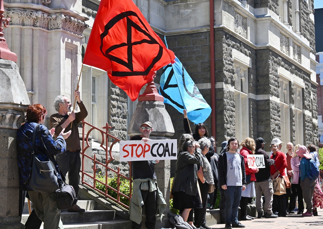 A demonstration outside the Dunedin courthouse during the sentencing of coal protesters yesterday...