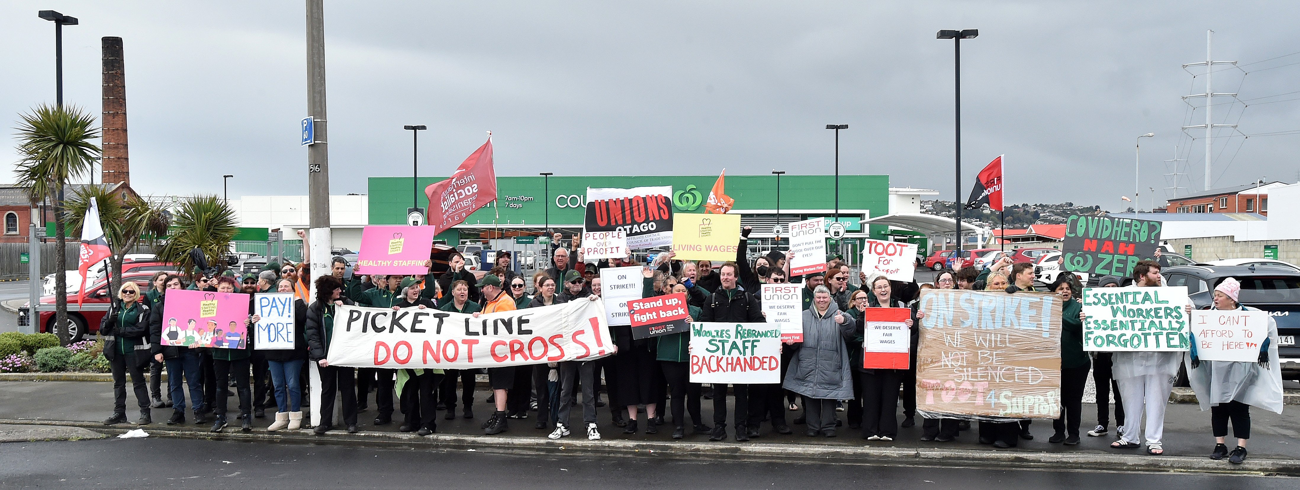 Woolworths union members from supermarkets around Dunedin gather outside the South Dunedin...