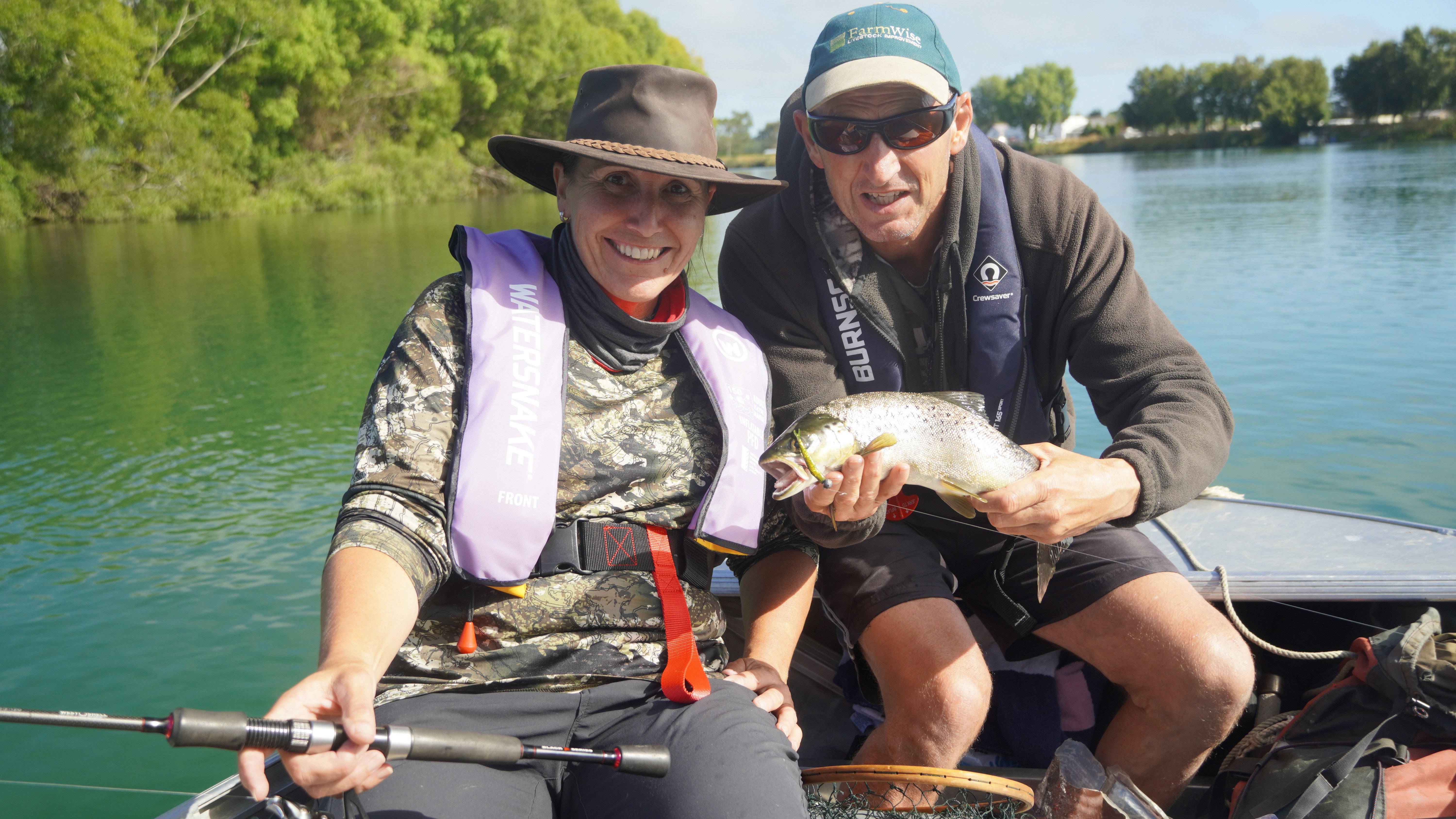 Kelly Maynard and John Lyall fish for trout and perch in the lower Clutha River/Mata-Au. PHOTO:...