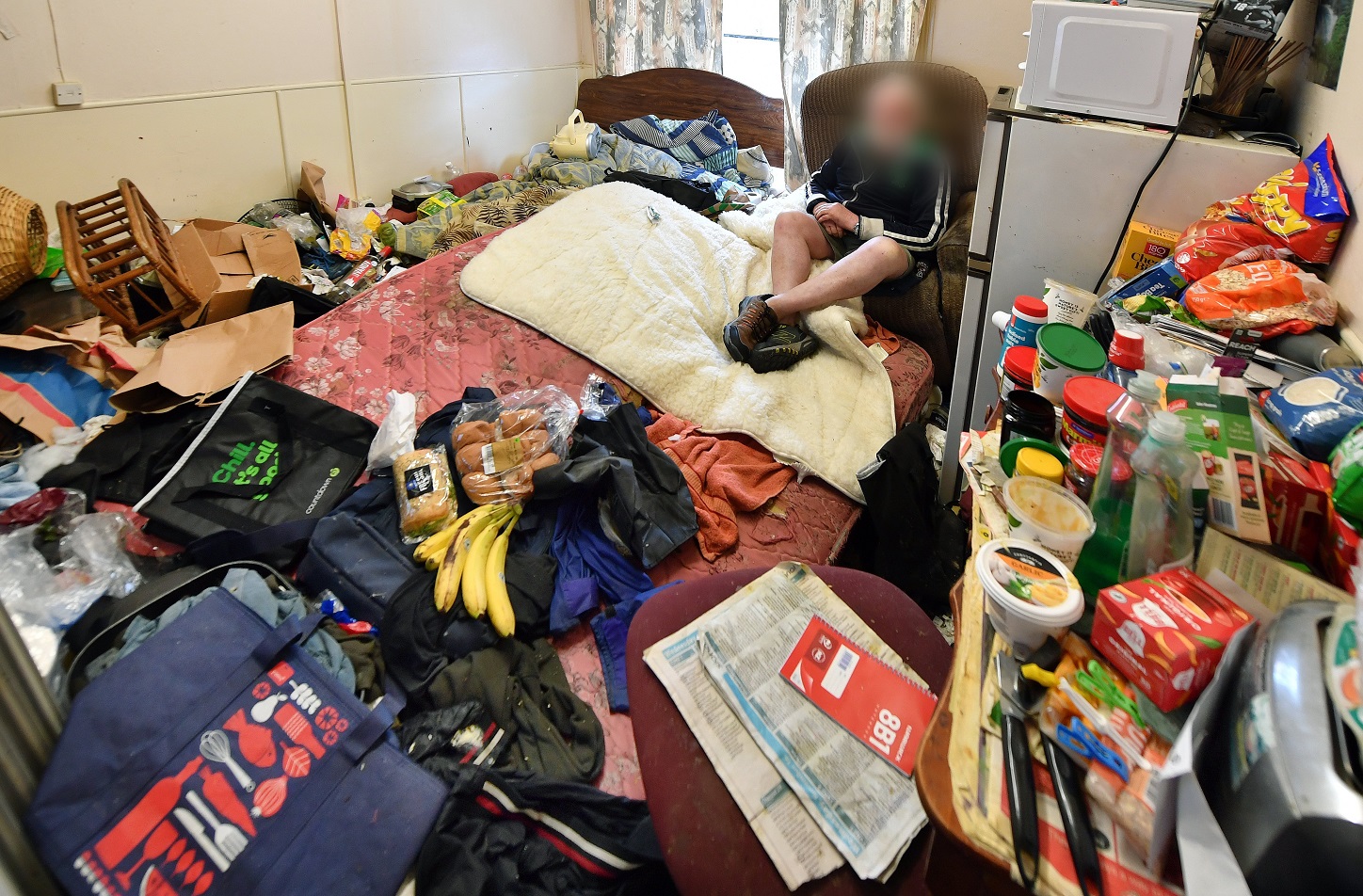 Mark in a run-down boarding house last year.