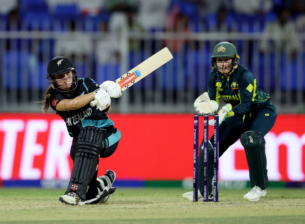 Melie Kerr bats against Australia as Alyssa Healy looks on during the T20 World Cup this year....