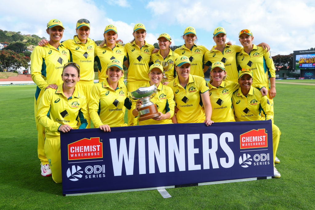 Australian players pose with the Rose Bowl and series trophy after their victory in Wellington....