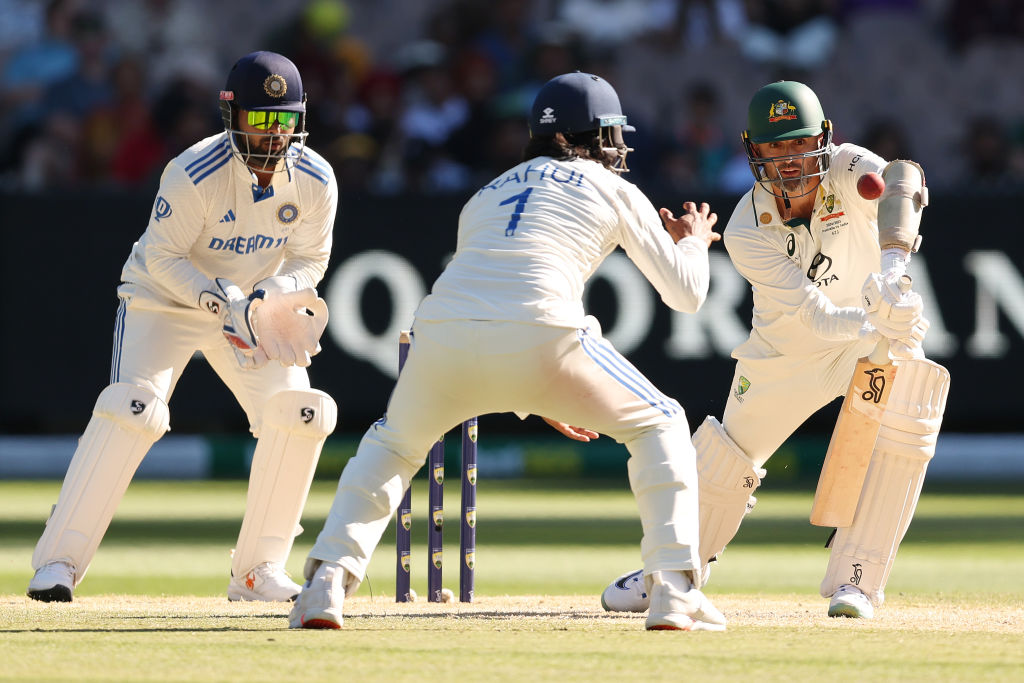 Nathan Lyon bats during Australia's final-wicket partnership with Scott Boland against India at...