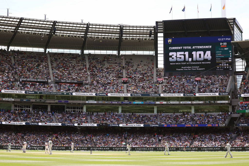 Melbourne's MCG scoreboard showing a record attendance at lunchtime on Monday, the last day of...