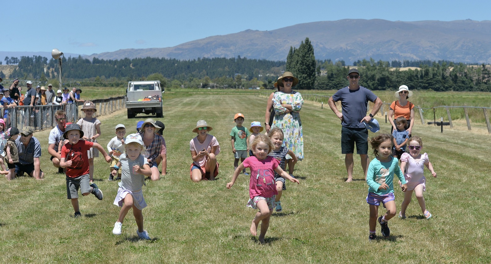 Children show off their sprint styles at the 2020 meeting.