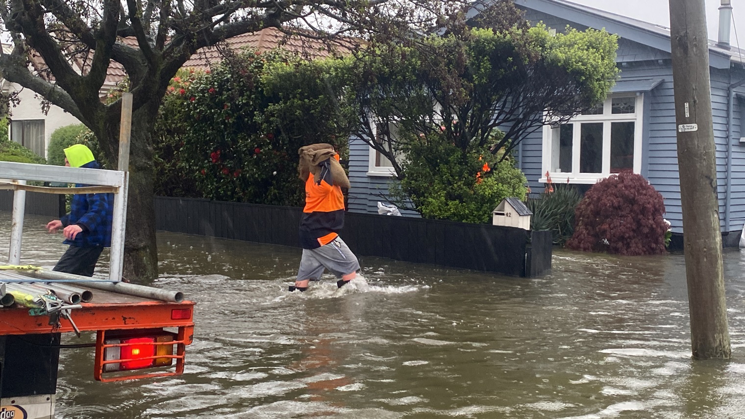 Sandbagging in Cranley St, Tainui, during the October flooding. Photo: ODT files