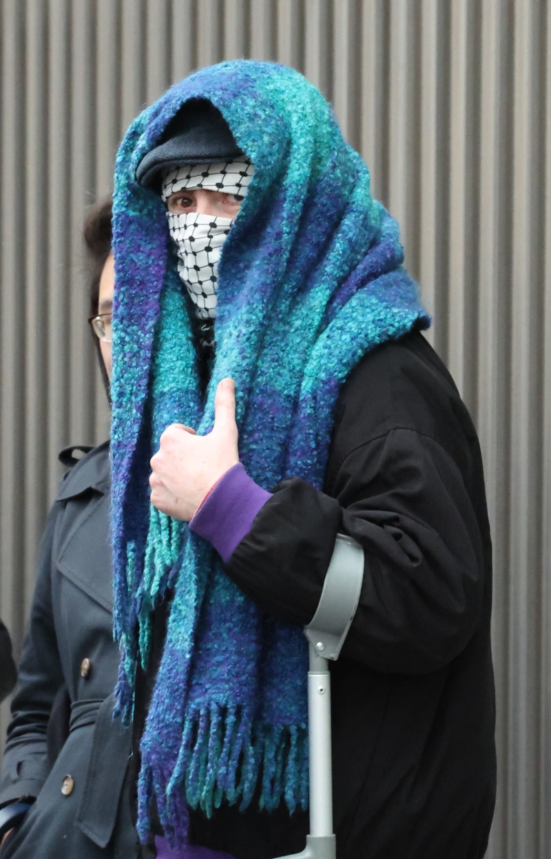 Jack Brazil appears covered up in court in Dublin. Photo: Paddy Cummins