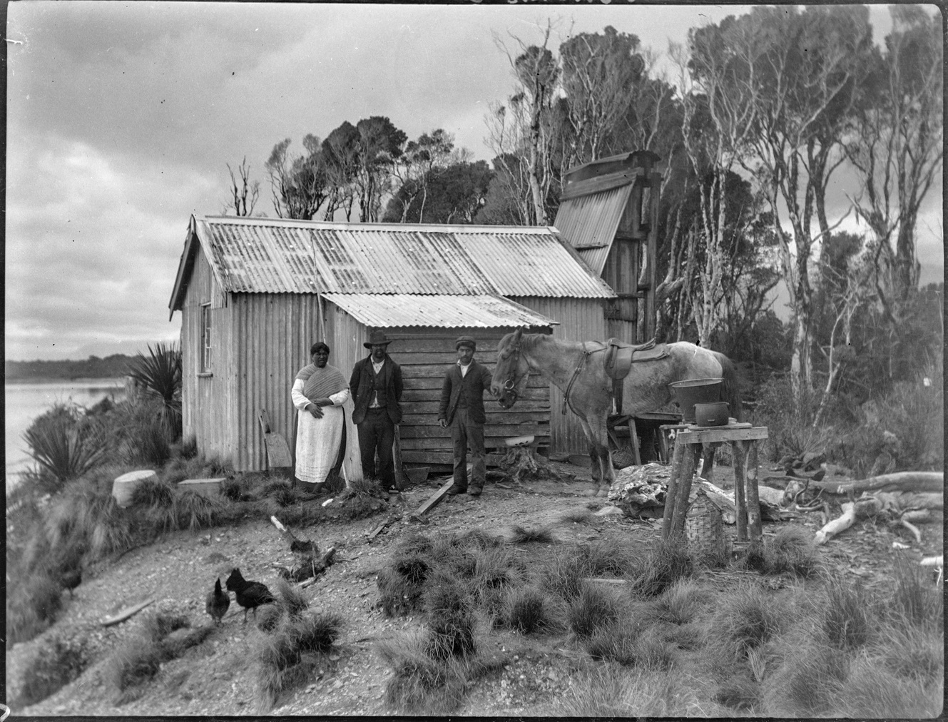 Rīpeka Te Ōwai, daughter of Te Kere Tūtoko, with two unidentified men but possibly her son Hare...