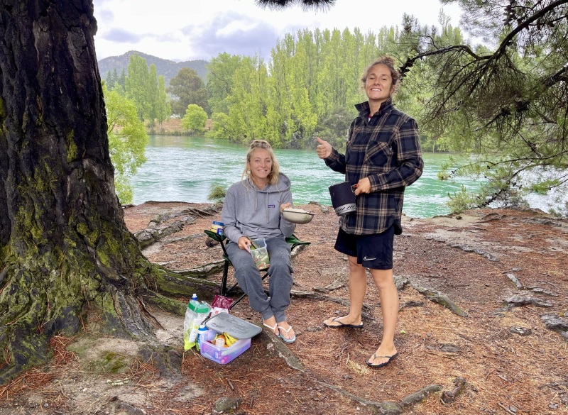 French midwives Noemie Berton and Alexane Guyomard prepare dinner in the Albert Town Campground....