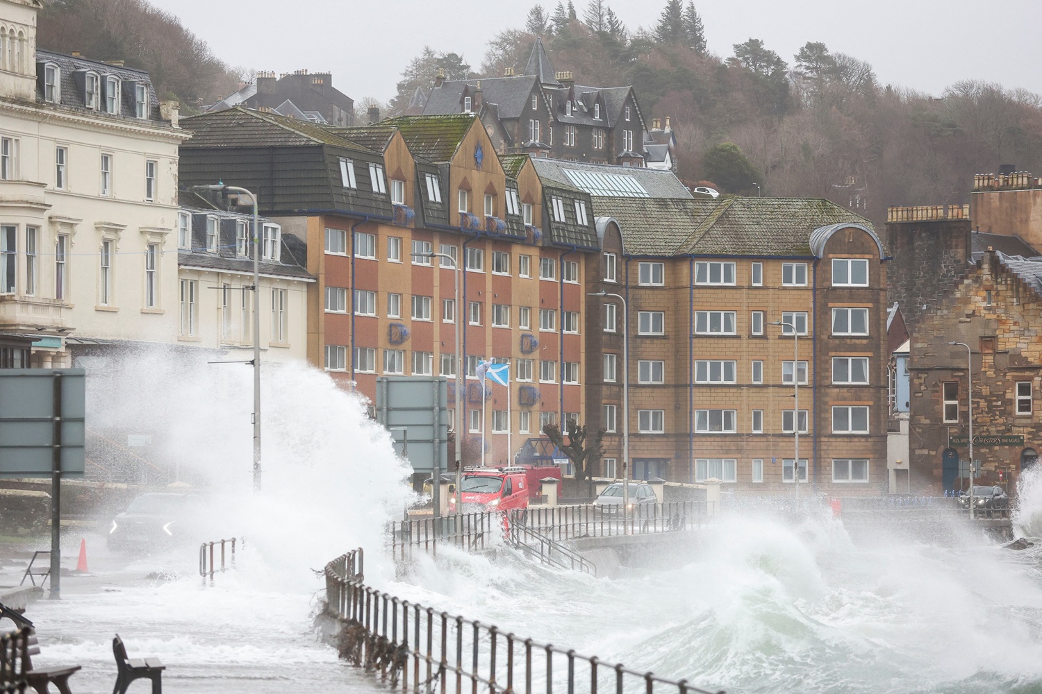 Waves crash over the seafront as Storm Eowyn hits in Oban, Scotland. Photo: Reuters