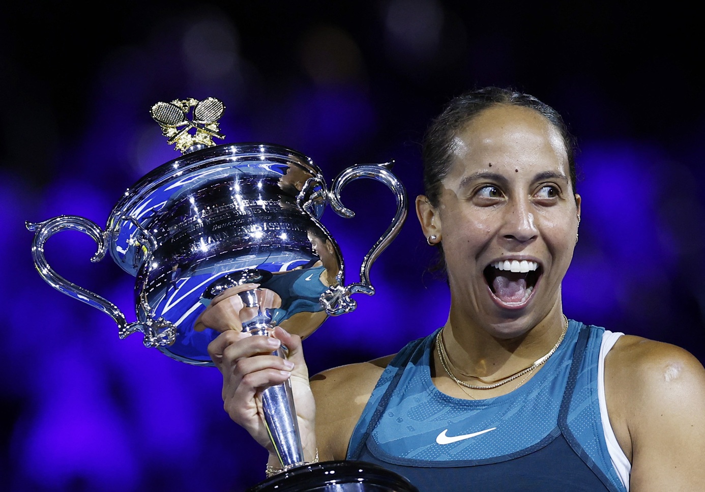 Madison Keys celebrates with the trophy after her victory in the Australian Open final. Photo:...