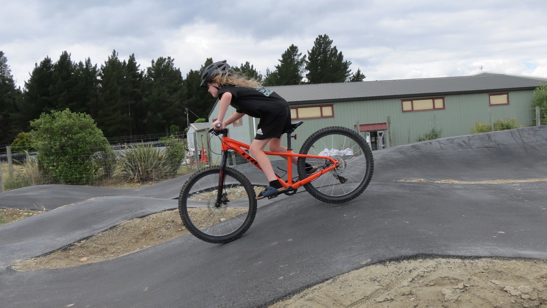 Ali Campbell practises her pumping technique. Pumping is an essential skill in BMX. Photo: Ella...