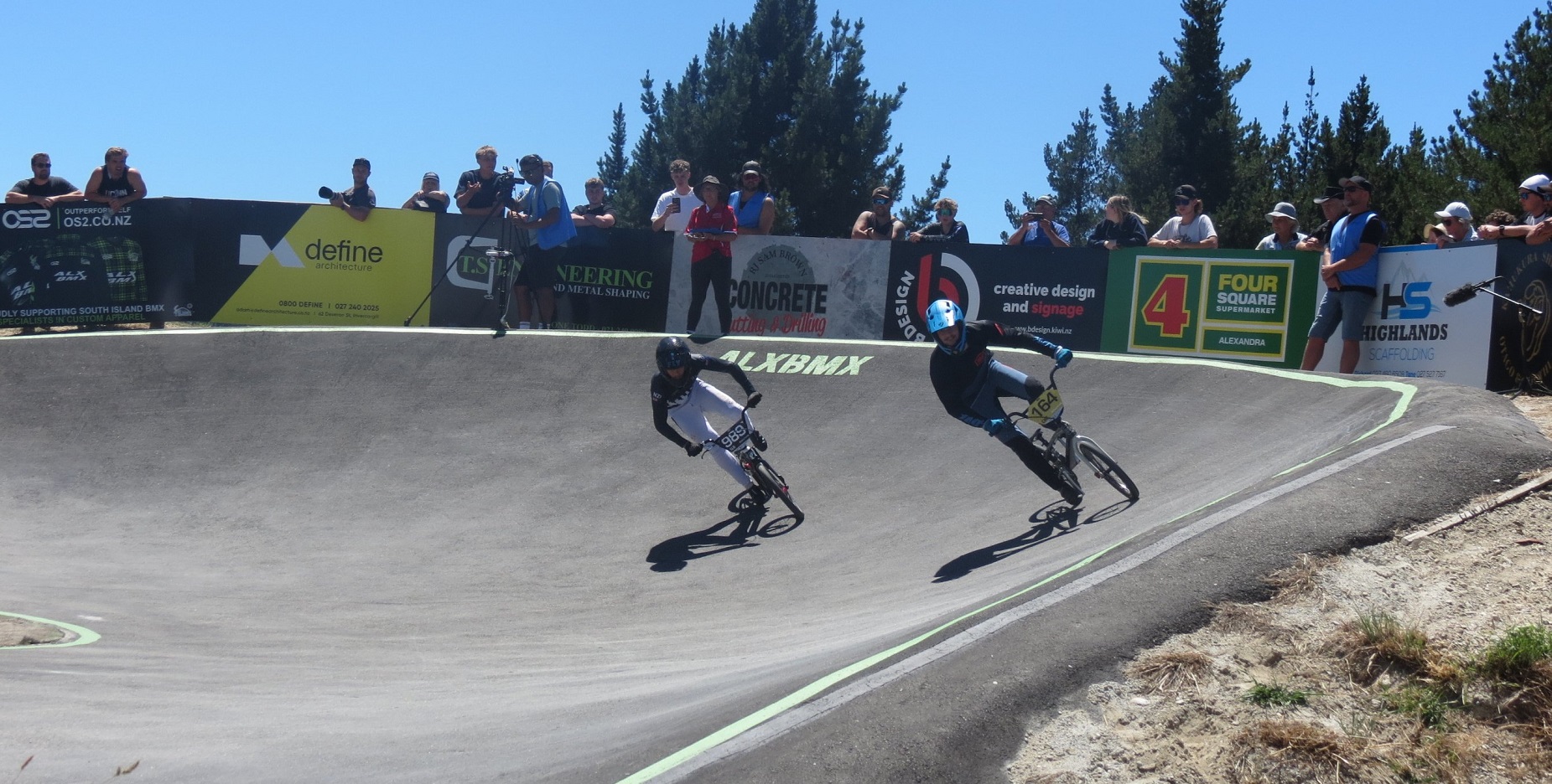 Riders Keenan Brown (right), of Christchurch, and Nick Cowie, of Southland, turn the final corner...