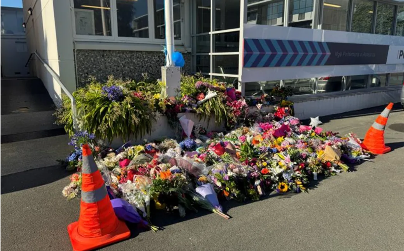 Flowers outside the Nelson Police Station. Photo: RNZ