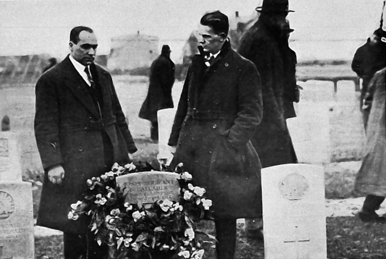 All Blacks Cliff Porter (tour captain) and Fred Lucas lay a wreath on the WW1 grave at Nine Elms...