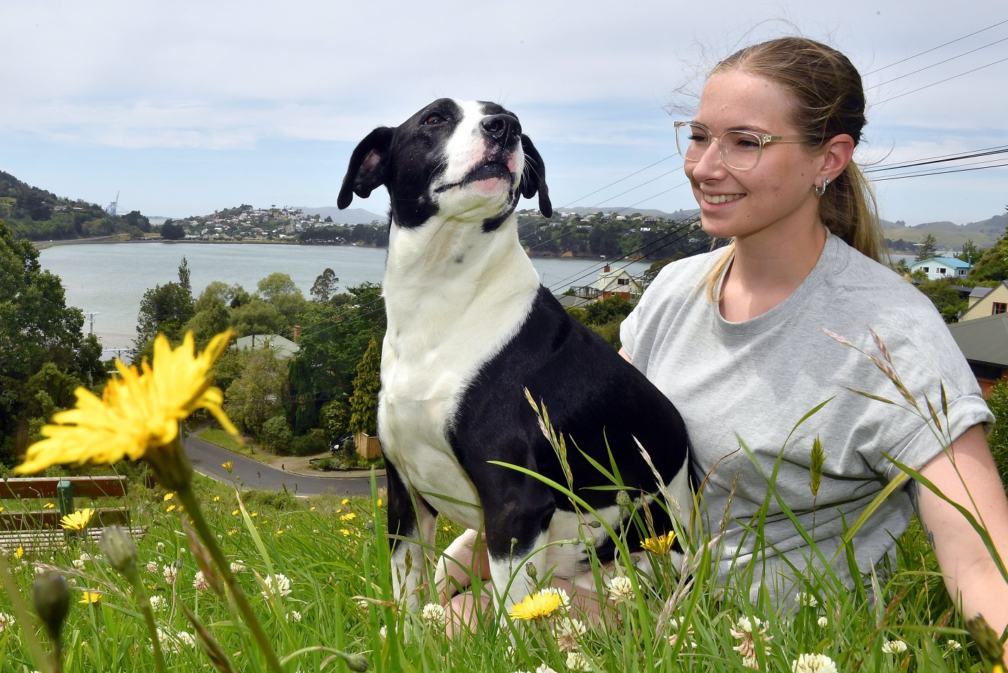 Emma Scott takes a moment with her dog Gus as she prepares to head overseas for stem cell...