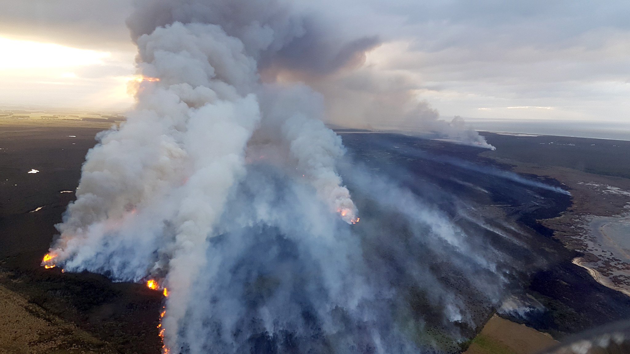 Multiple fire crews and appliances from as far as Glenorchy and six helicopters with monsoon...