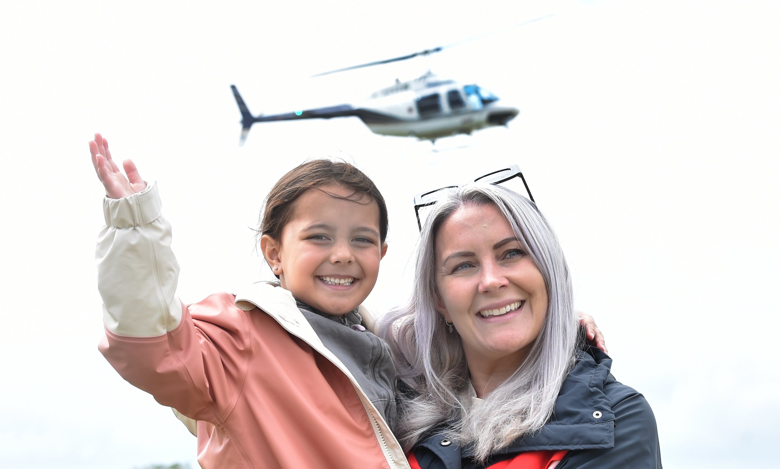 Mia Perry-Ellison and her mum, Nicole, of Dunedin, have fun at the Brighton Gala Day yesterday,...