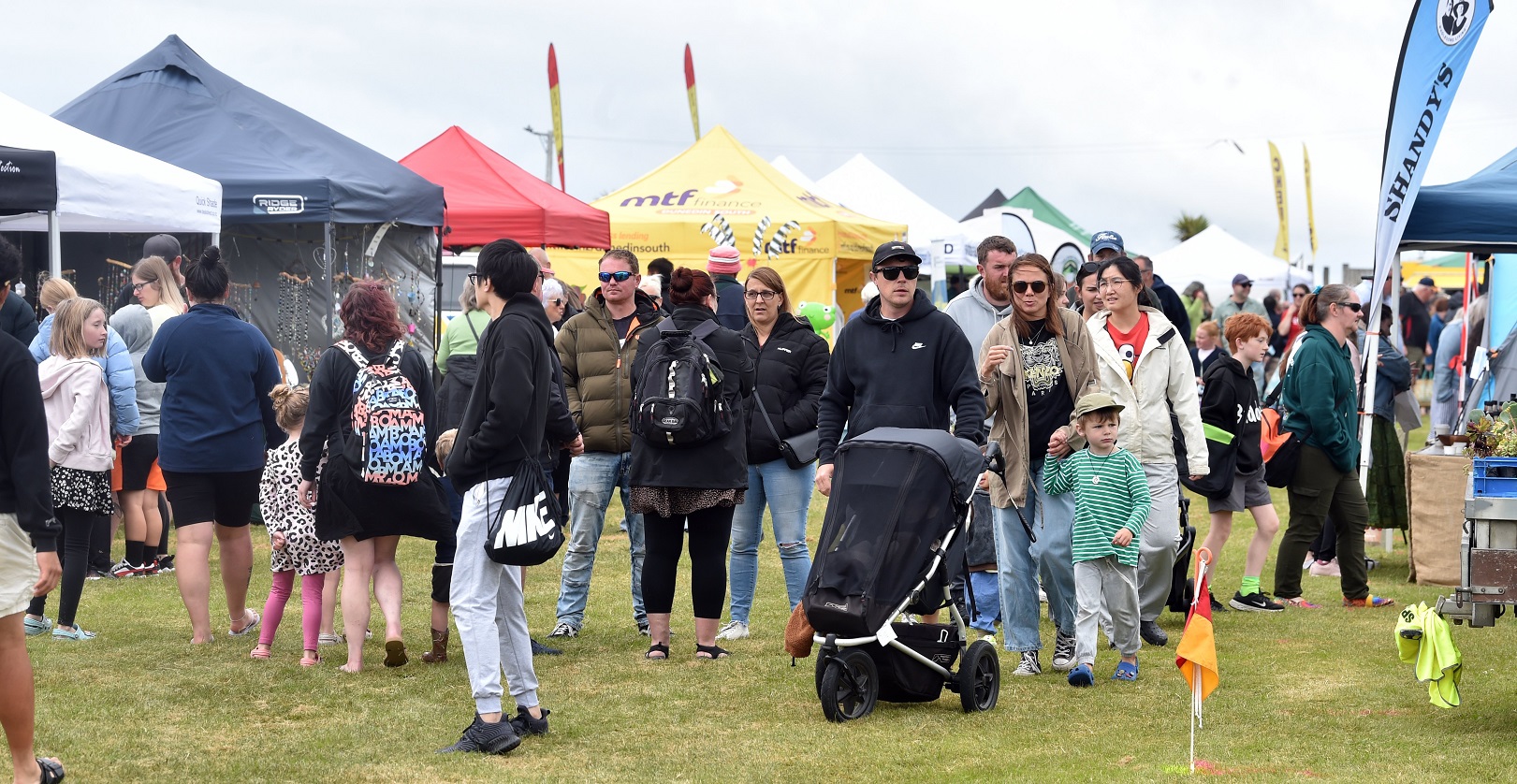 People make their way through the stalls at the Brighton Gala Day.