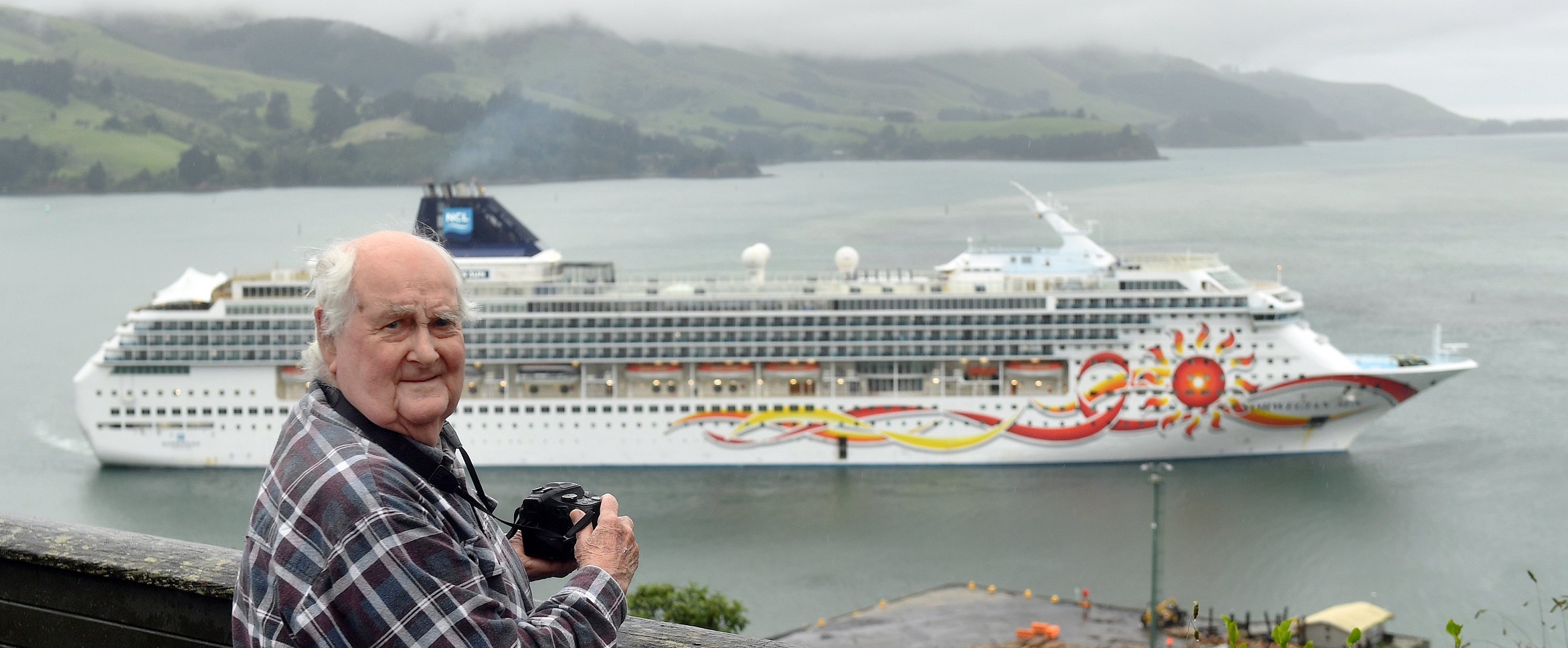 Port Chalmers retiree and nautical historian Garry Bain observes Norwegian Sun arriving into port...