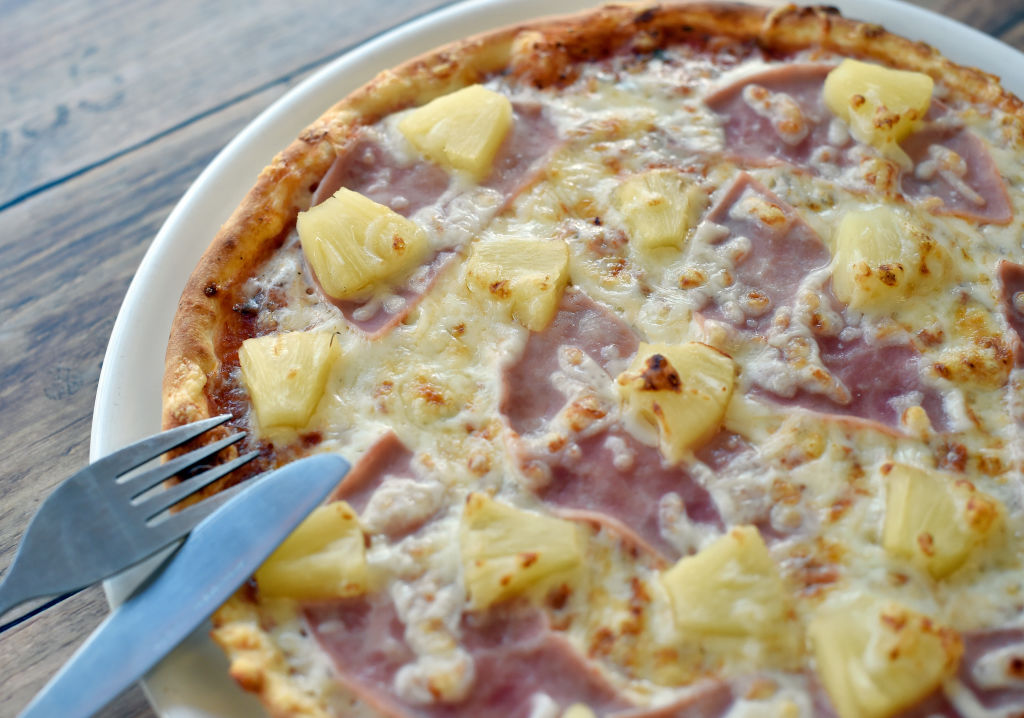 A classic ham and pineapple pizza. Photo: Getty Images