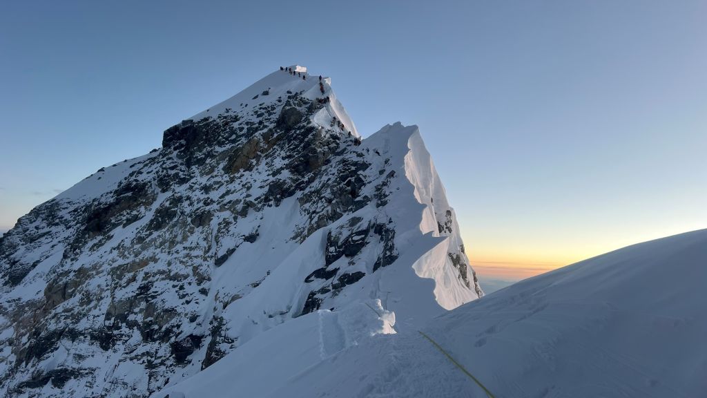 Climbers reach the peak of Mt Everest. Photo: Getty Images