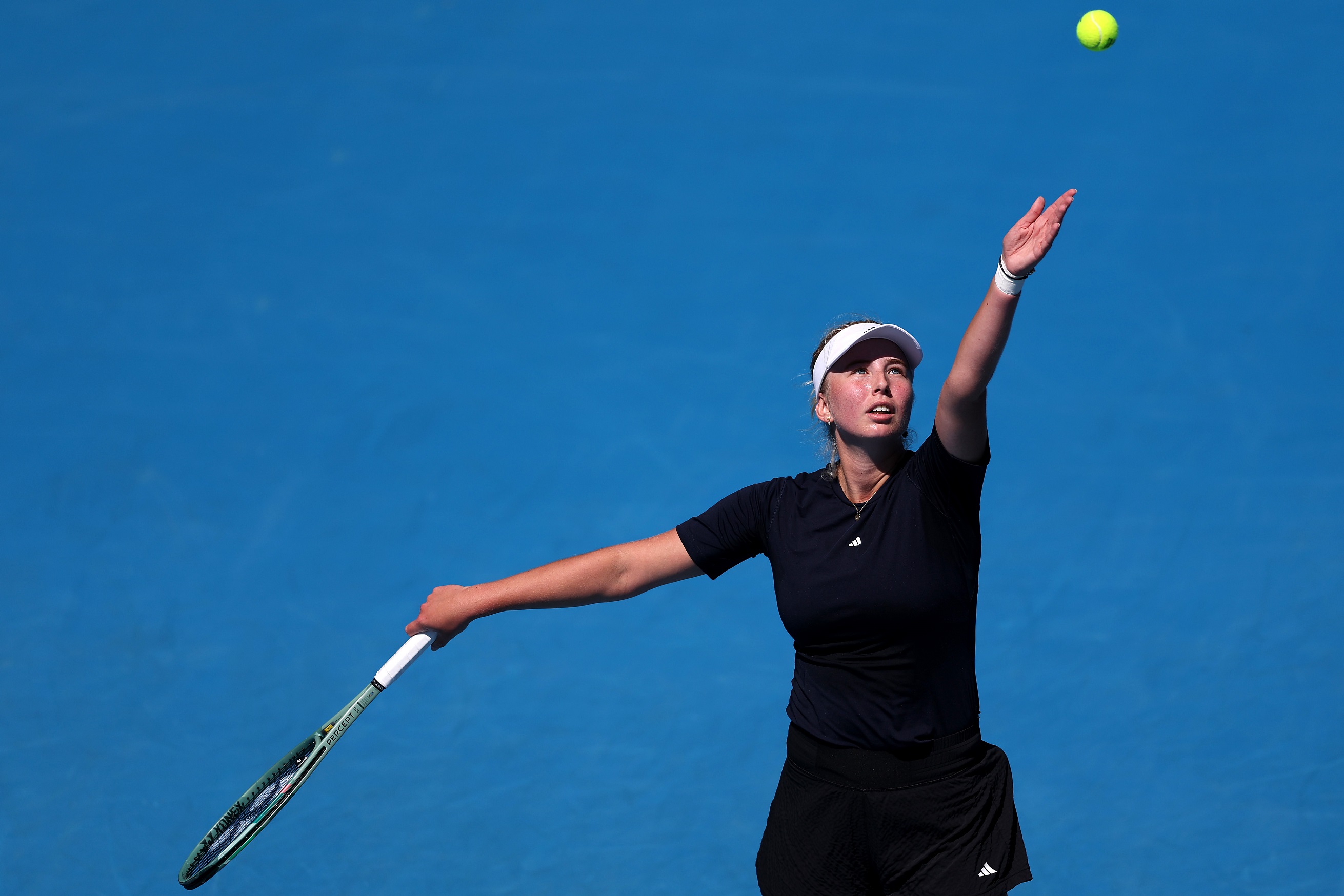 Clara Tauson of Denmark serves in her semi final match against Robin Montgomery of the USA at the...