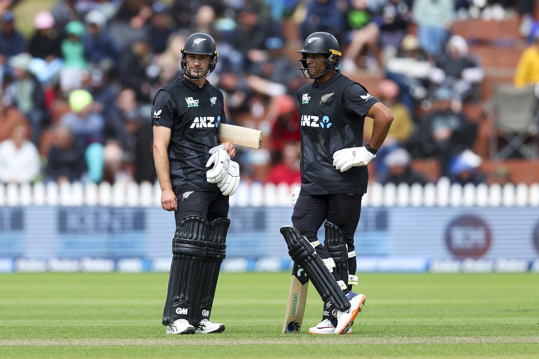 New Zealand's Rachin Ravindra, right, and Will Young during the first ODI international cricket...