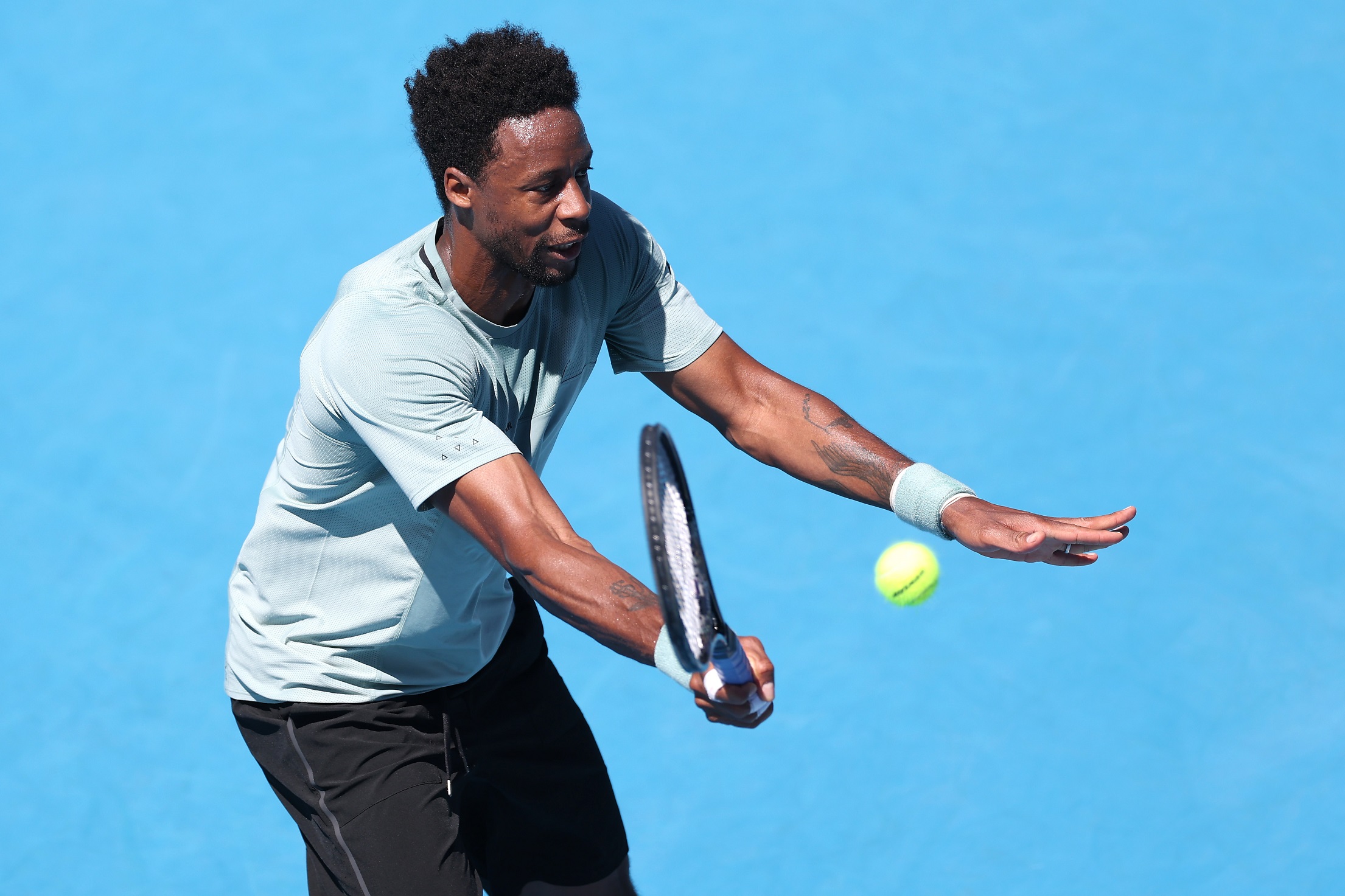 Frenchman Gael Monfils plays a forehand during his first-round match against Spaniard Pedro...