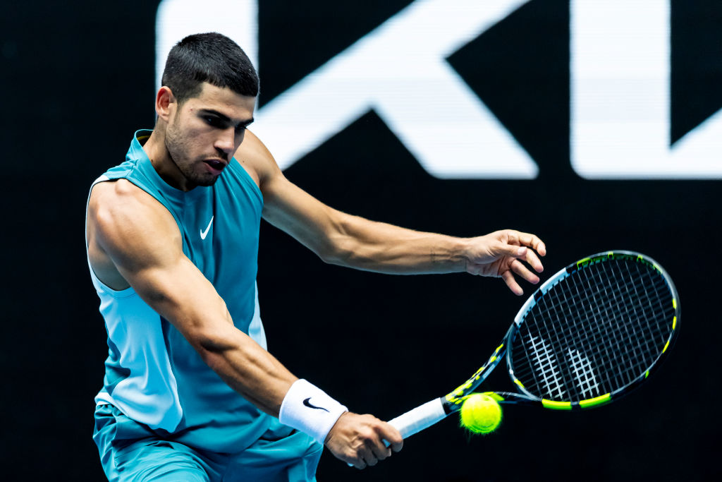 Carlos Alcaraz plays a backhand during his second round win yesterday at the Australian Open....