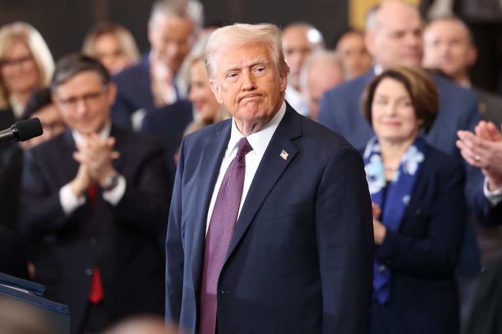 President Donald Trump is applauded after delivering his inaugural address in the US Capitol...