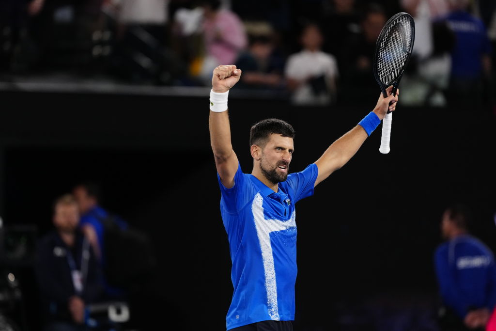 Novak Djokovic celebrates his win over Carlos Alcaraz at the Australian Open last night. Photo:...