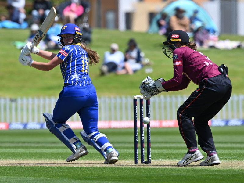 Otago Sparks batter Olivia Gain flicks the ball down the leg side in front of Northern Brave...