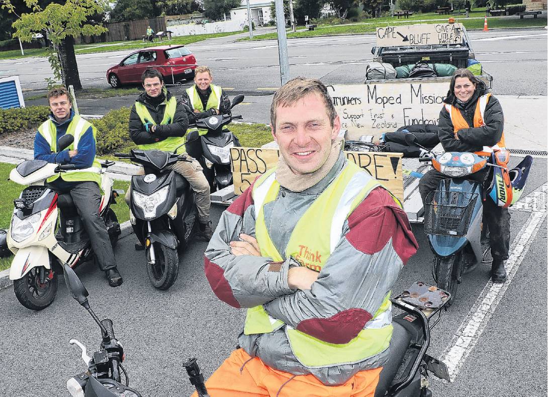 The merry band of moped marathoners (from left) Jed McCready, Aidan Fleming, Caleb Smith, Hamish...