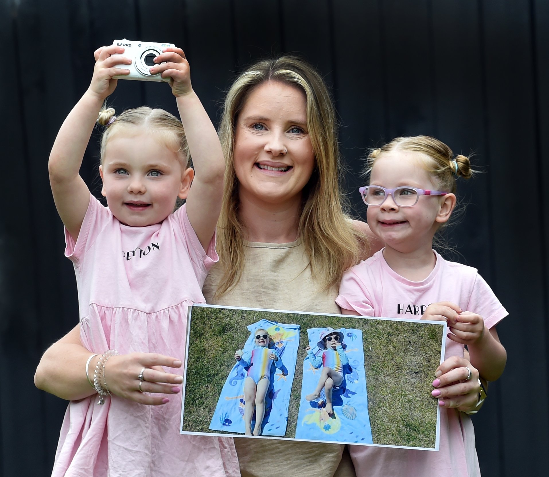 Michaela Lobb shows off her winning Otago Daily Times "Magic Moments" photograph, alongside the...