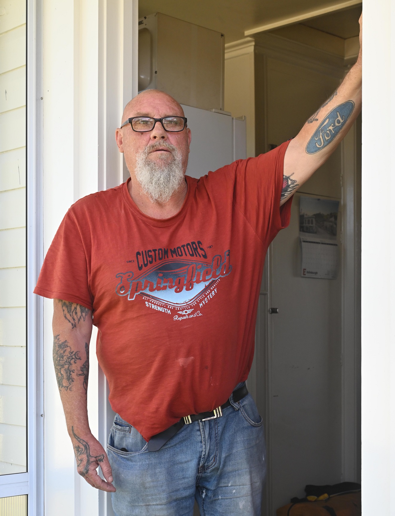 Kāinga Ora tenant Wayne Kearns stands in the doorway of his Mosgiel home. Photo: Gerard O'Brien