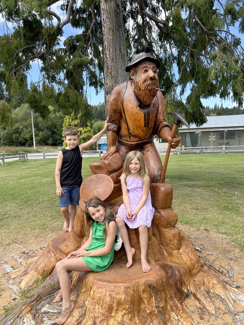 Checking out the completed miner sculpture by Jakob Stadler at the Naseby playground are (from...