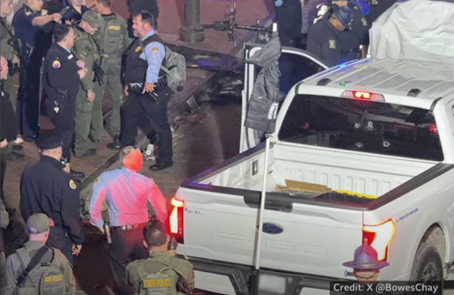 The truck swerved past makeshift barriers before ramming the crowd, authorities say.