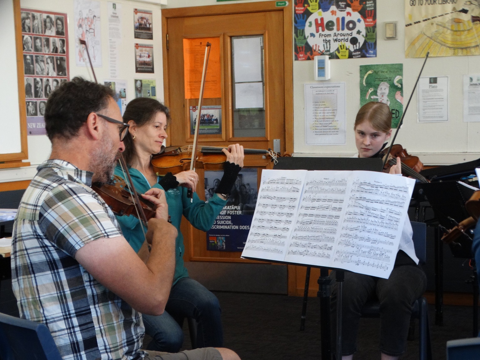 Violin tutor Anne Loeser (middle) leads fellow violinists Nick Sheen, of Dunedin, and Charlotte...