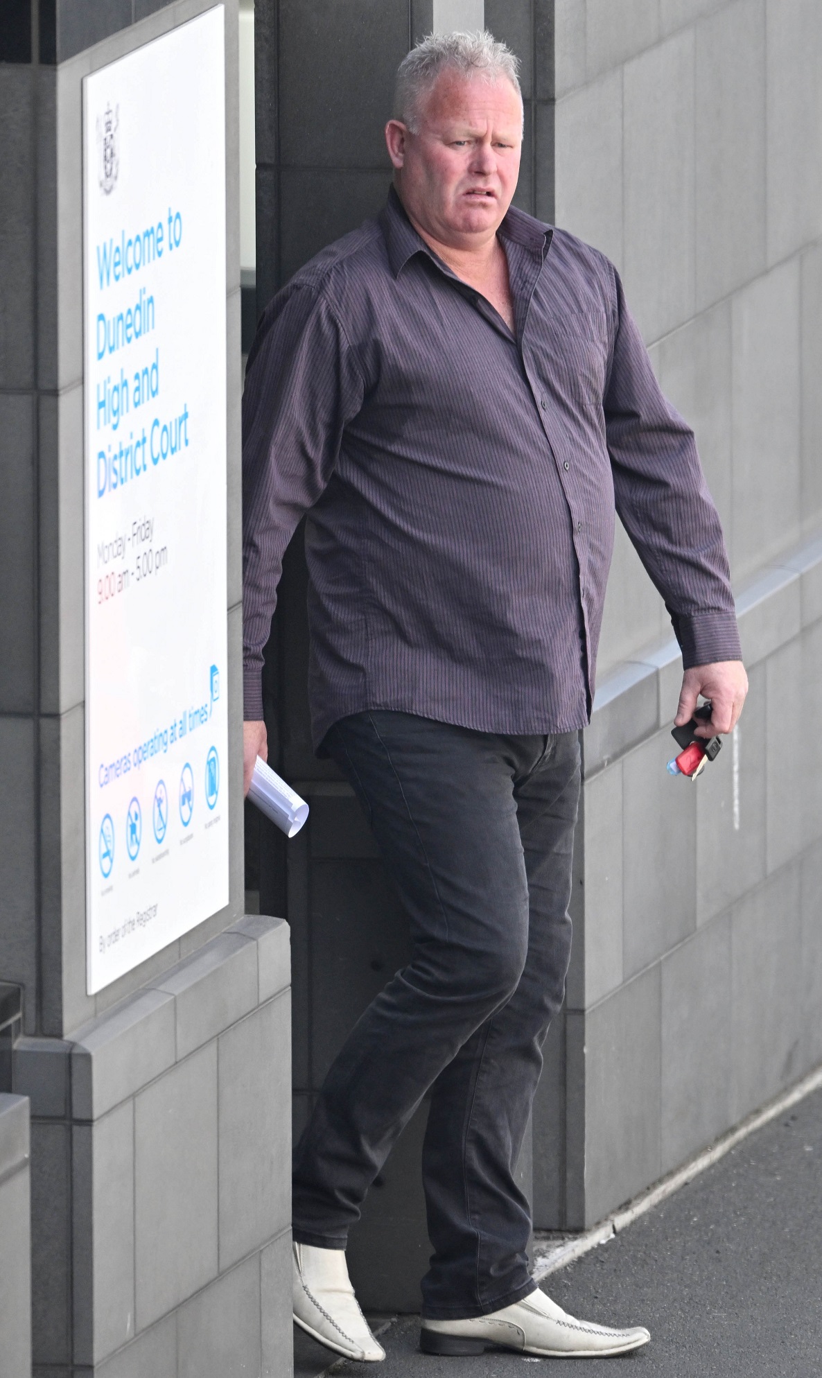 Paul Kinney leaves the Dunedin District Court yesterday after he was sentenced to 200 hours’...