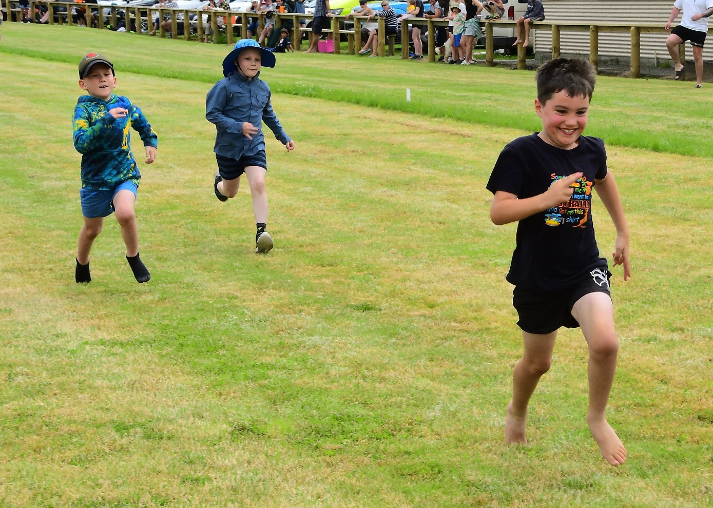 Brady De Vries, 7, of Invercargill, wins a 7-year-old boys’ race.