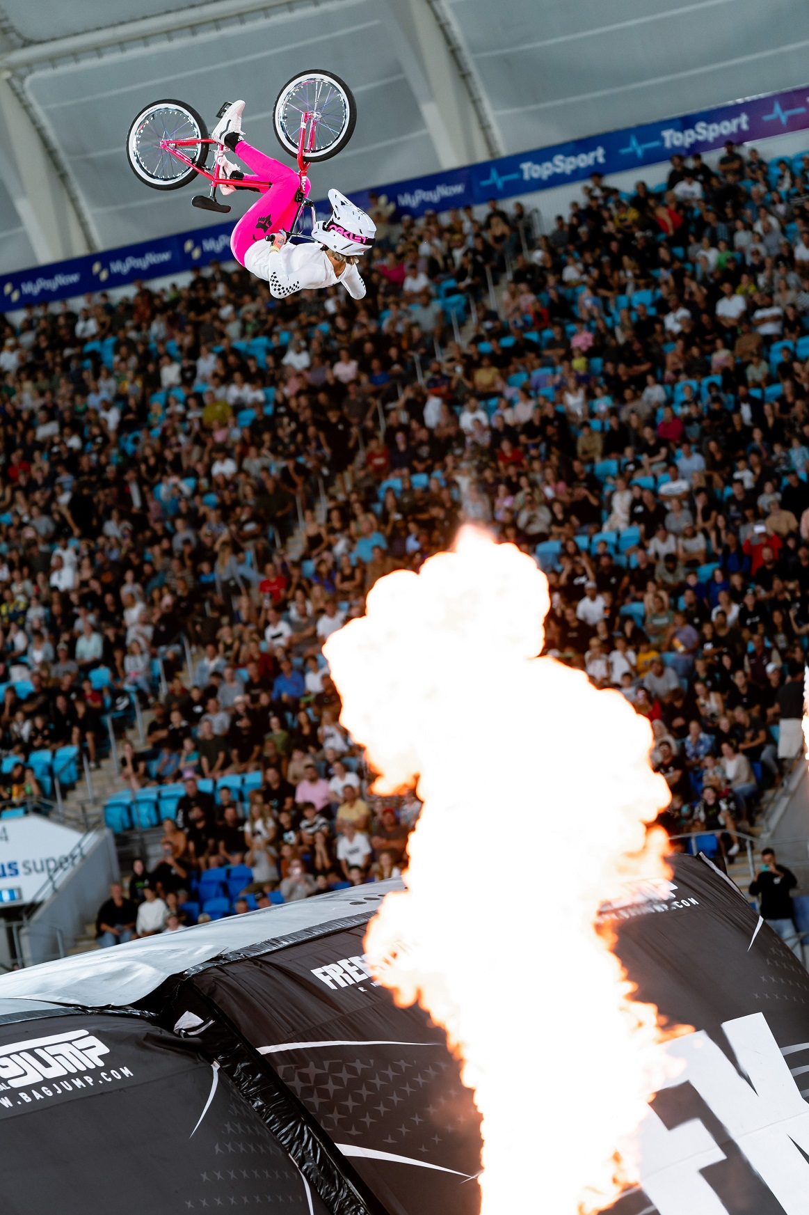 BMX rider Ellie Chew, of Kapiti Coast, performs in her trademark bright pink outfit at a previous...