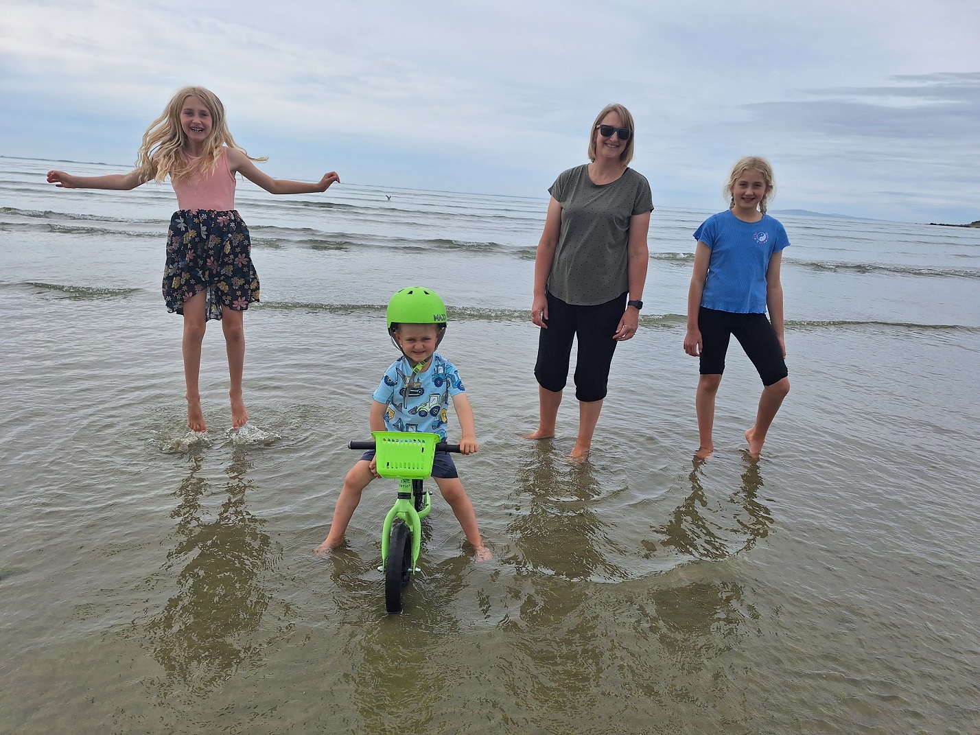 Taking a dip at Riverton Rocks Beach are (from left) Peyton, 8, Ernie, 3, Brooke and Ria Burgess,...