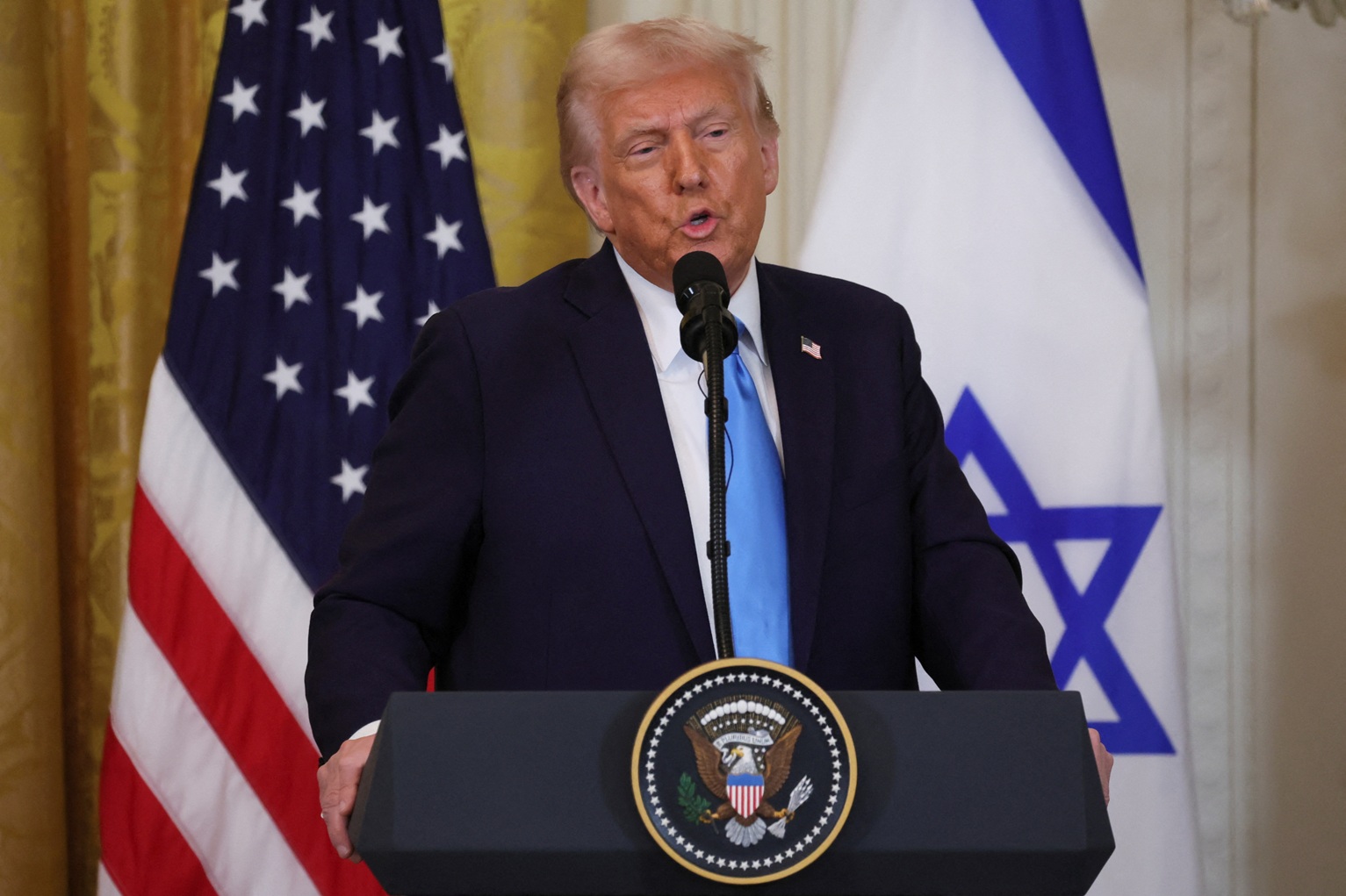 US President Donald Trump speaks during a joint press conference with Israeli Prime Minister...