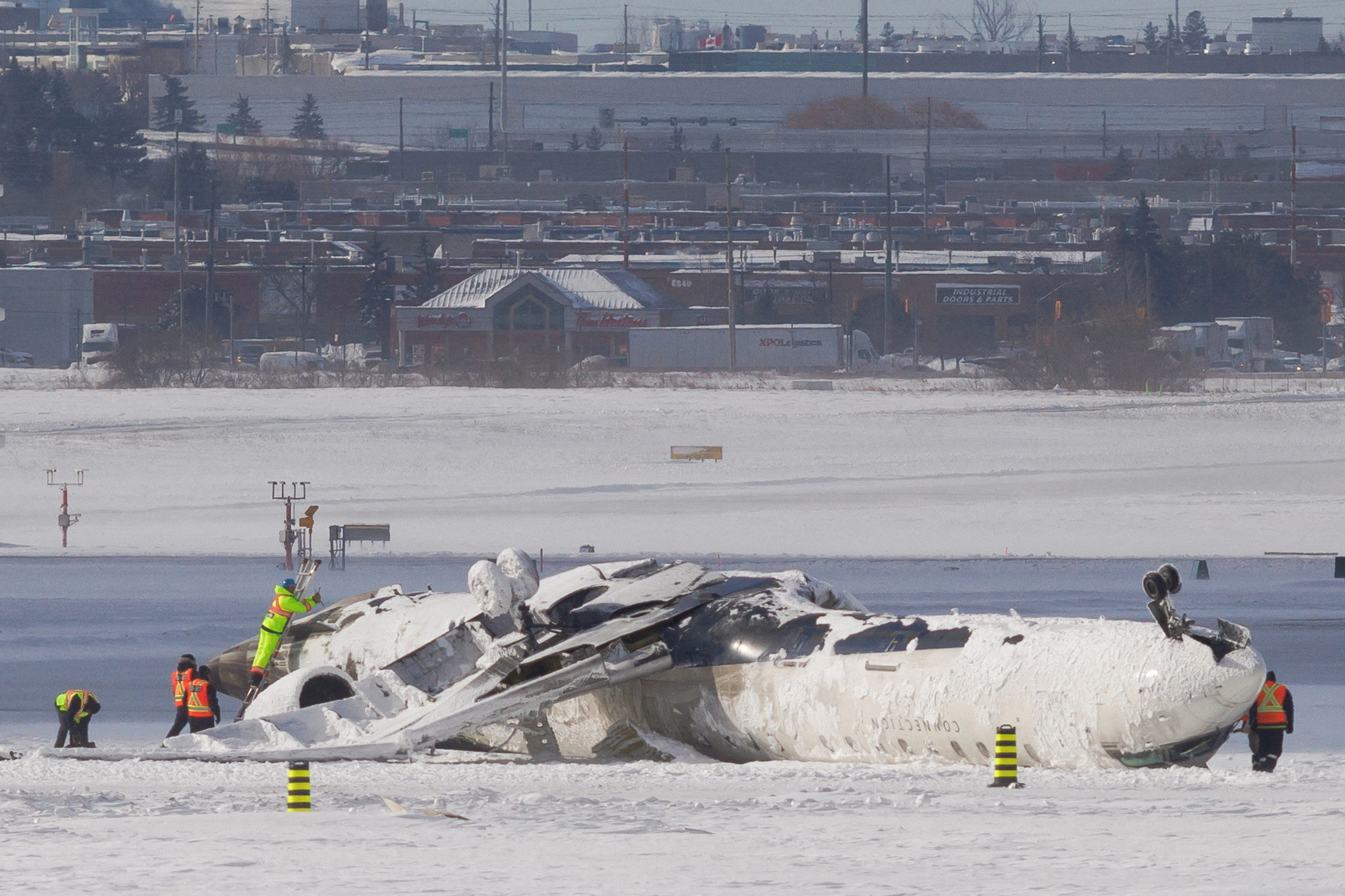 The  CRJ900 aircraft went belly-up at Toronto's Pearson Airport. Photo: Reuters  