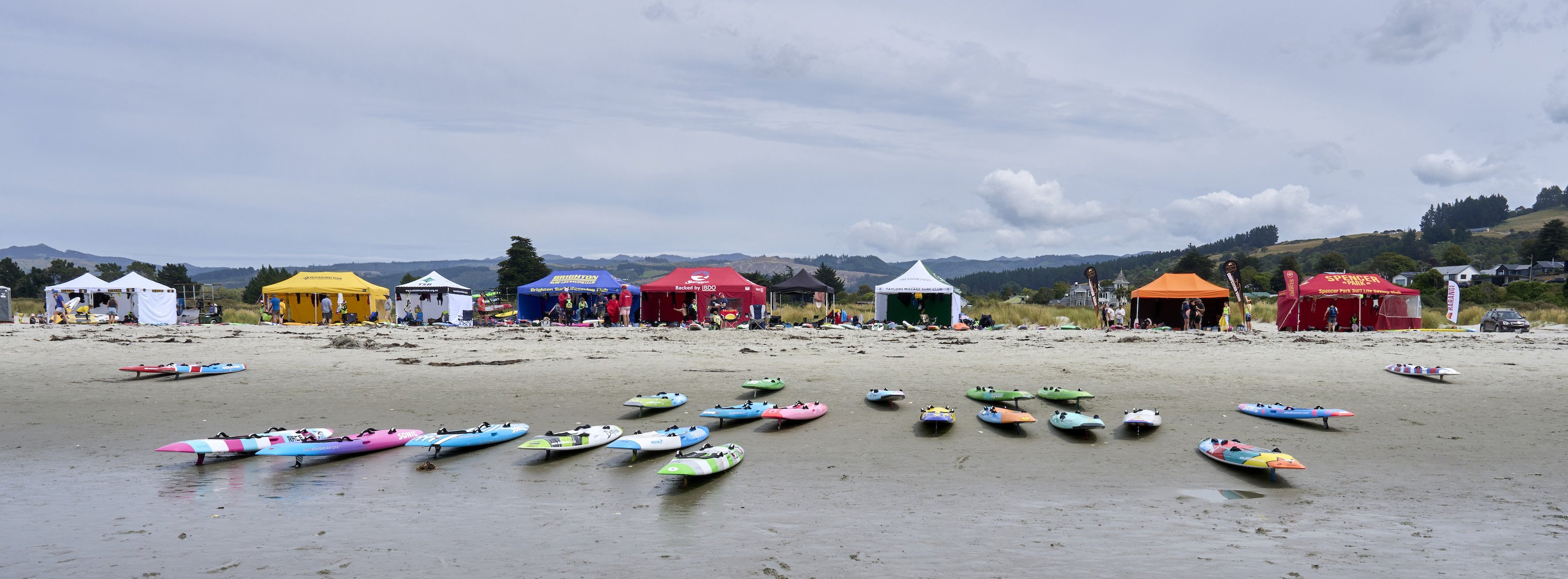 Kneeboards litter the beach at Warrington as juniors prepare for competition in the water during...