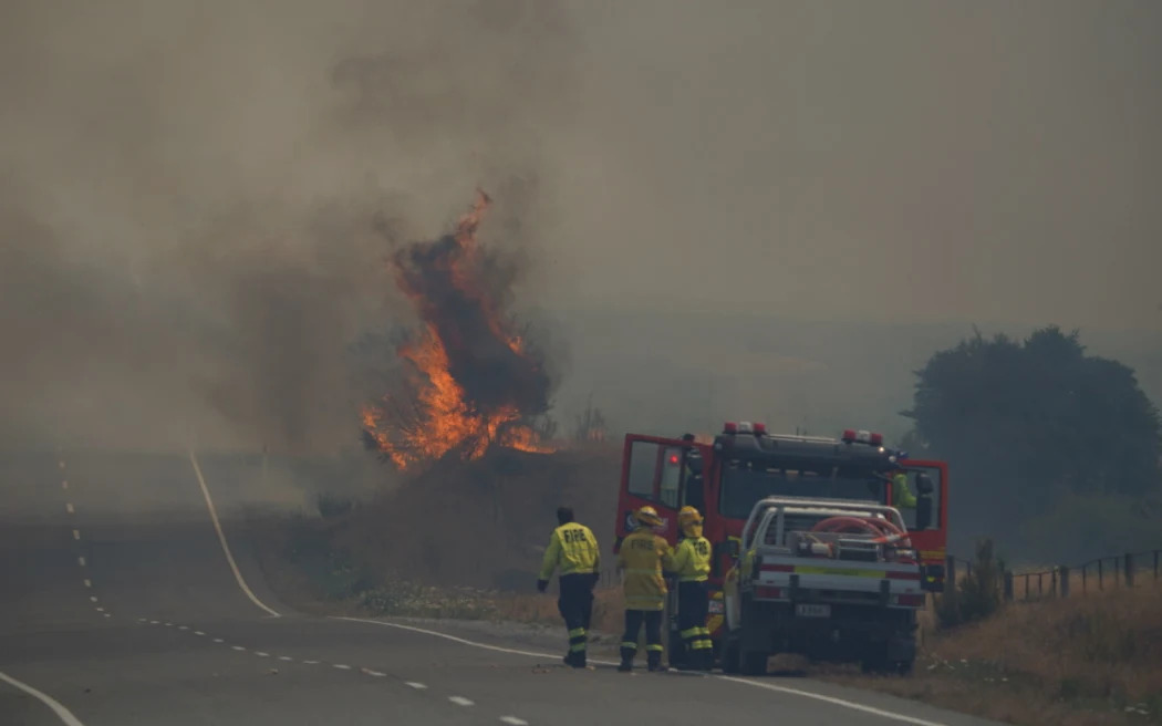 Nine helicopters, 20 Fire and Emergency trucks, and 40 firefighters are battling the Hurunui...