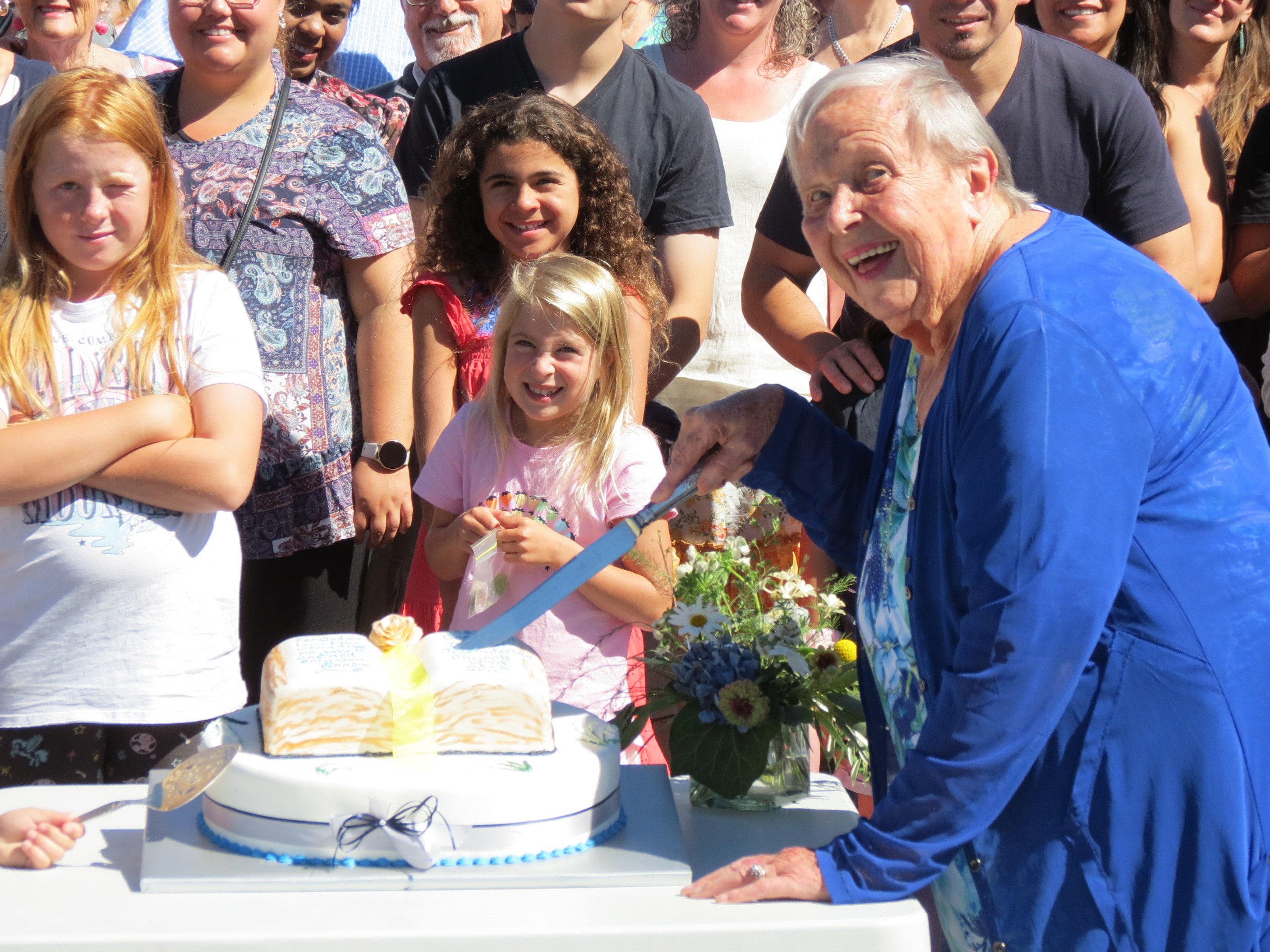 Anne da Nez, 92, cuts the cake celebrating Cromwell and Districts Presbyterian Church’s 150 years...