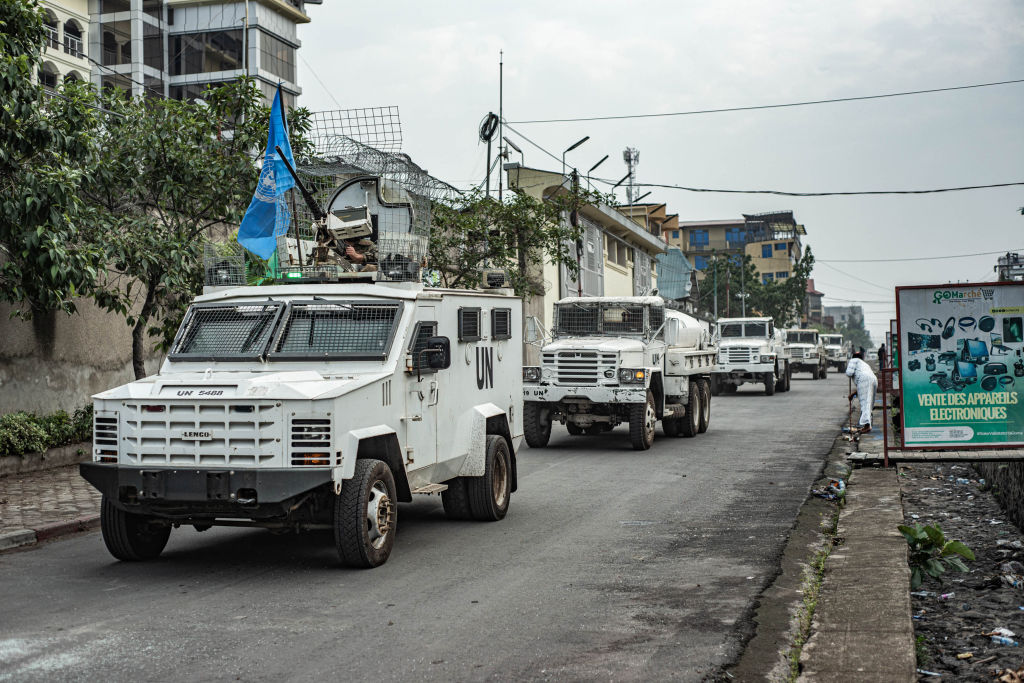  A convoy of United Nations vehicles drives down a road as M23 rebels retained control of Goma....